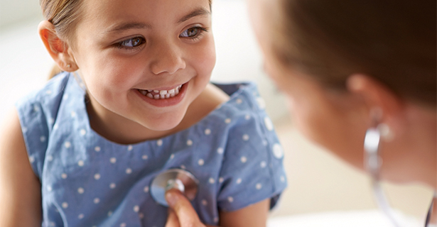 Child smiling at doctor
